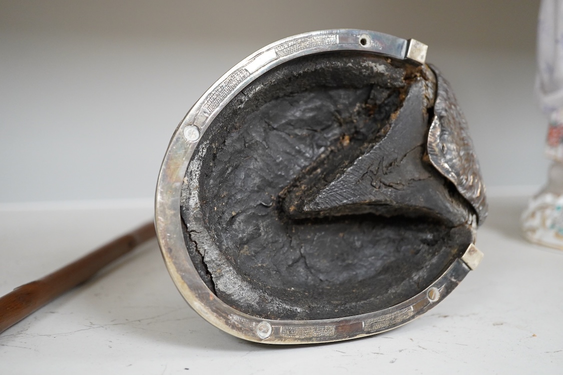 A Victorian electroplate mounted memorial horse hoof inkwell, 11cm high and a white metal mounted riding crop